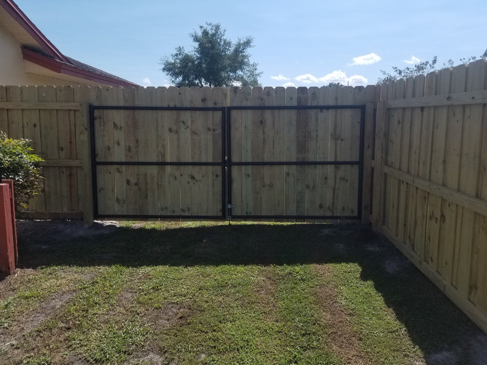Wood fence installation by Jay Fencing